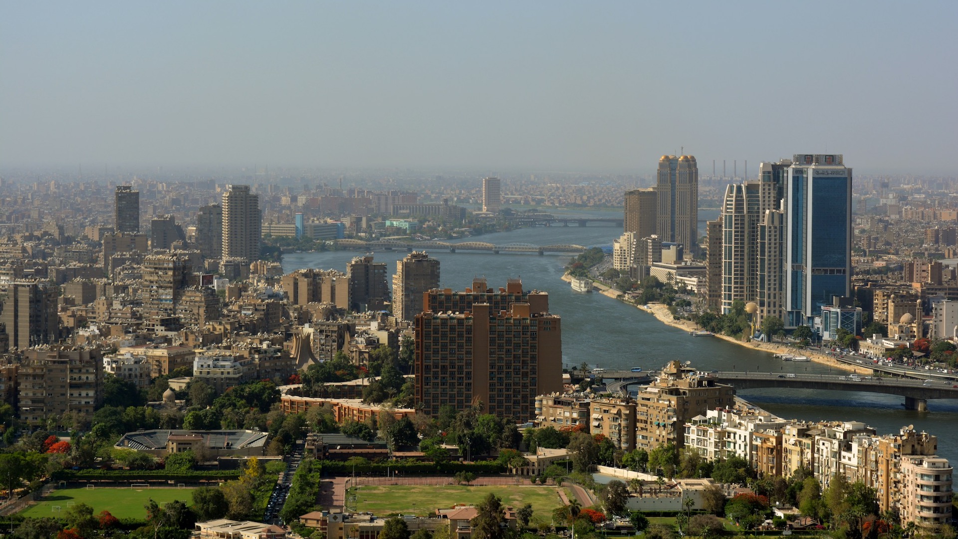 Cairo Skyline with Nile River and Pyramids